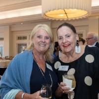 Dottie Johnson and Meg Willit smiling and posing for photo